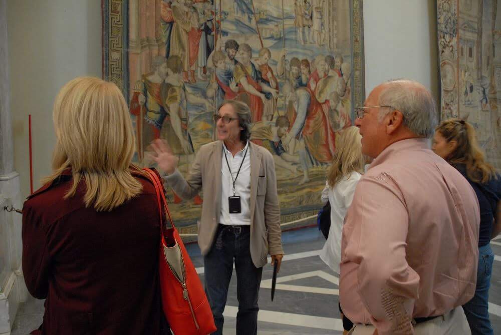 Earliest Entry Sistine Chapel tour (2) a group of people standing in a room