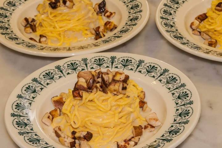 a table topped with plates of food on a plate