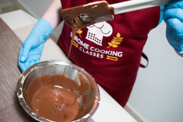 a close up of a doughnut and a cup of coffee