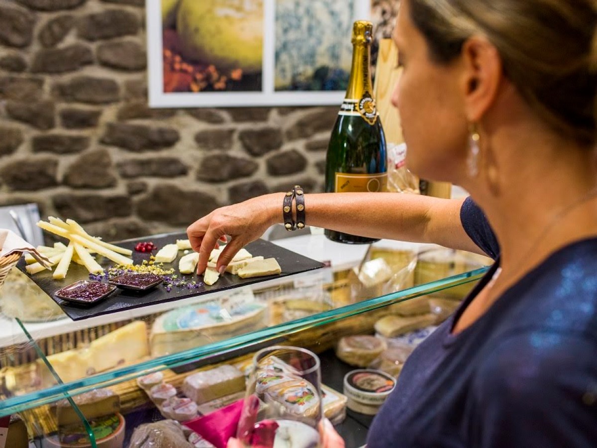 a woman sitting on a table