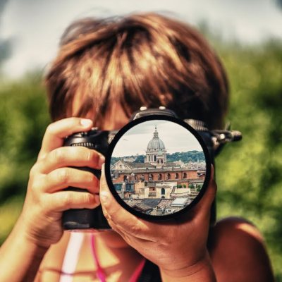 a close up of a person holding a cell phone