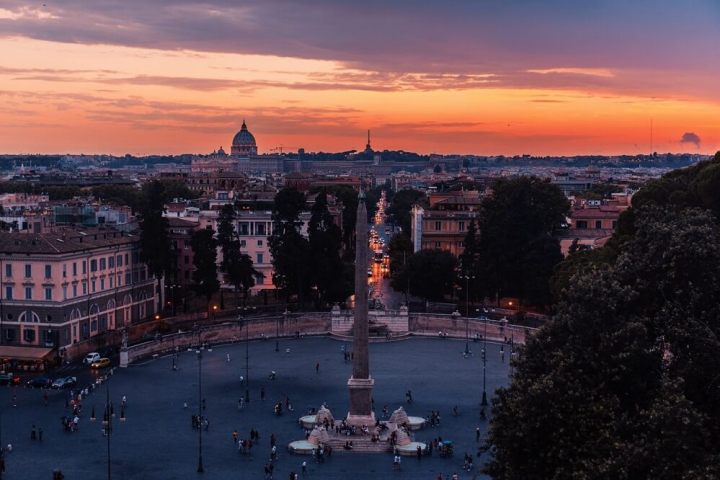 a view of a city at sunset